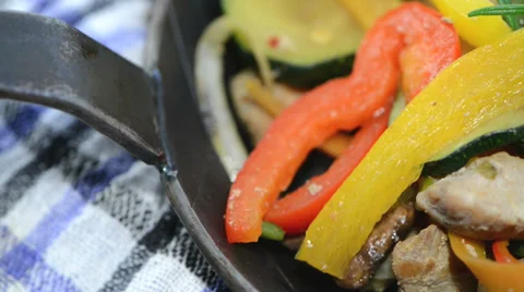 Fried vegetables with chicken (loopable) Stock Footage 34458140