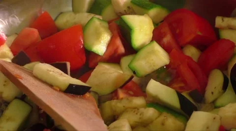 Fried vegetables on a frying pan close-up Stock Footage 63312678