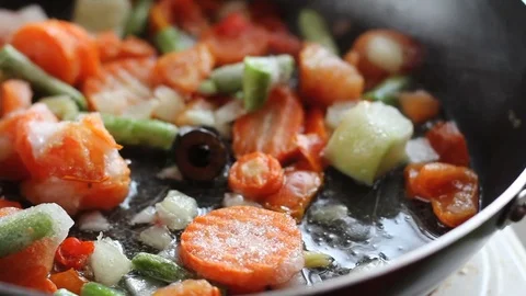 Fried vegetables in a frying pan Video stock 78479623
