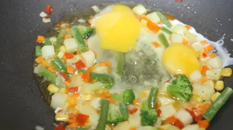 Fried vegetables pour the egg Stock Footage 49603500