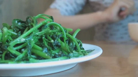 Fried vegetables in a restaurant Stock Footage 70372309