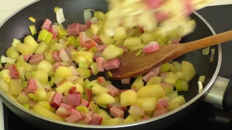 Fried vegetables,pasta,ham Stock Footage 68190969