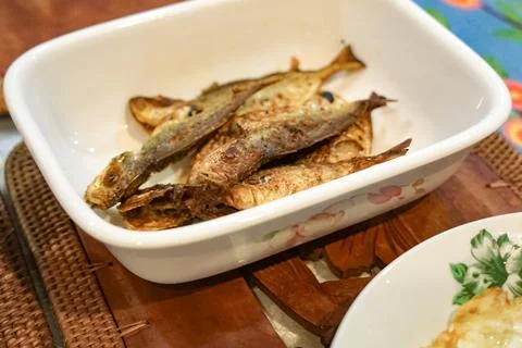 Fried Yellow stripe Scad On Ceramic Dish Stock Photos