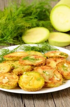 Fried zucchini with dill Foto stock
