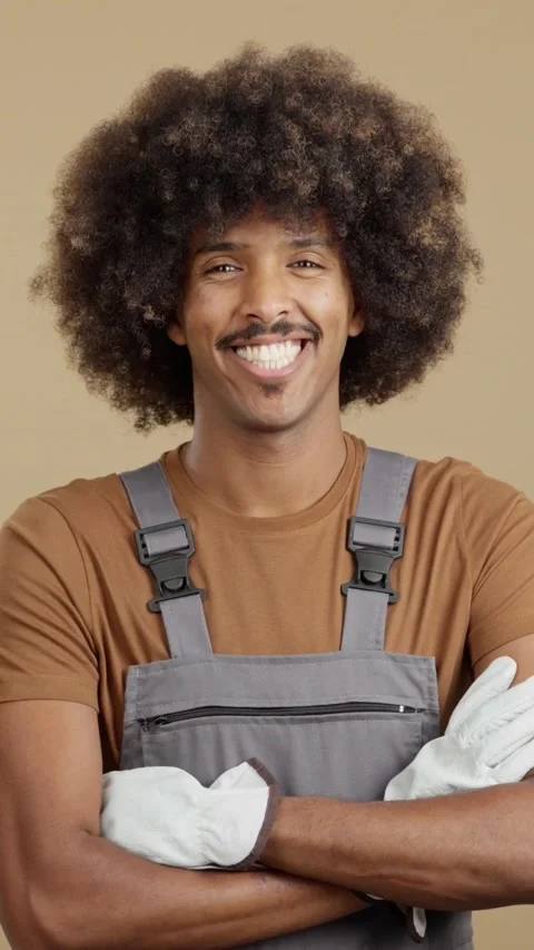 Friendly african man carpentry worker in work uniform Stock Footage 239265318
