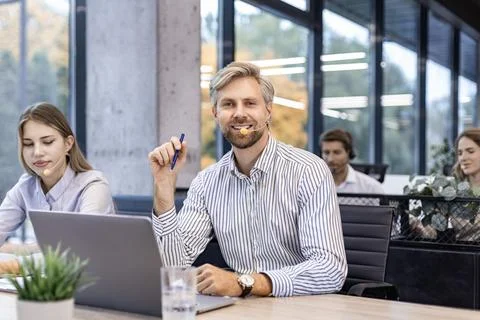 Friendly and helpful customer service support specialists in work Foto stock