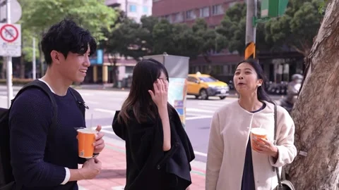 Friendly Chat at Intersection Near University in Da’an District, Taipei Stock Footage 281078433