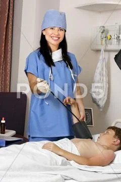 Friendly Doctor With Hospital Patient