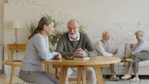 Friendly elderly people spending lesiure time in nursing home Stock Footage 117506603