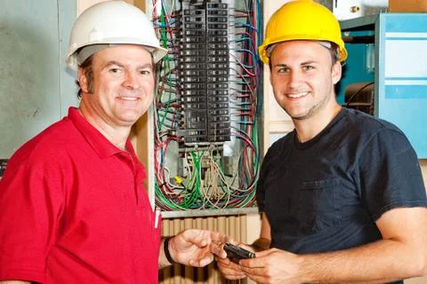 Friendly Electricians at Work Stock Photos