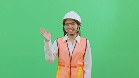 Friendly Female Engineer Waving Hand Hello Greeting on Green Screen Stock-Footage 331858288