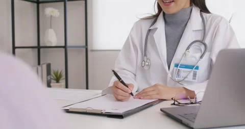 Friendly GP order Rx pill give medicalcare exam service to mature lady 動画素材 196034675