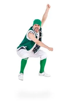 Friendly man dressed like a funny gnome jumping Isolated on white Stock Photos