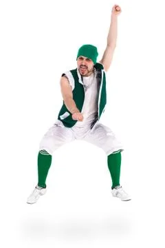 Friendly man dressed like a funny gnome jumping Isolated on white Stock Photos