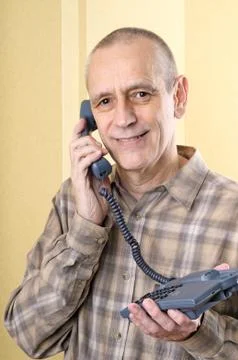 Friendly man on phone Stockfoto's