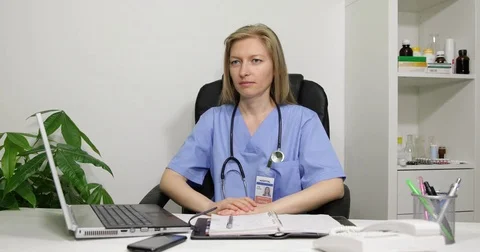 Friendly Medic Woman Looking Interview No Hand Sign Negative Response Cabinet Video stock 72779201