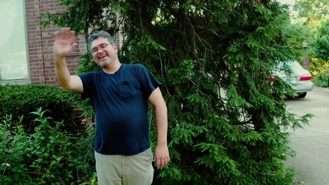 Friendly neighbor talking outside Stock Footage