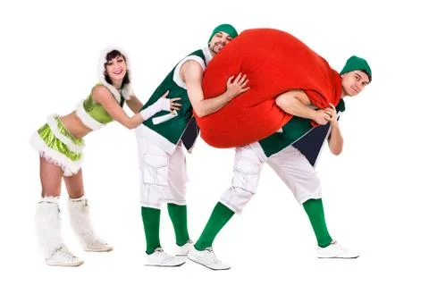 Friendly people dressed like a funny gnomes dancing, isolated on white Stock Photos