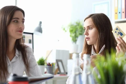 Friendly people at workplace Stock Photos