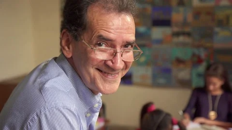 Friendly Teacher In Class Happy Professor Smiling At Camera Video stock 72167585