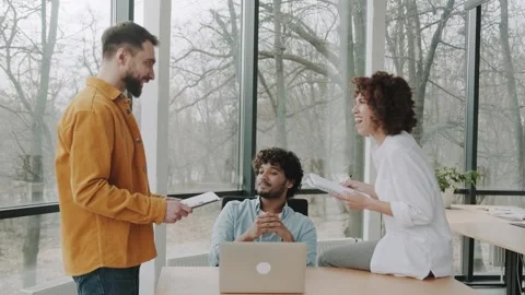 Friendly team of office workers, Dream Team have fun discussing the project and Stock Footage 240405899