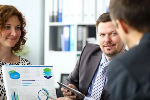 Friendly team working at new start-up Stock Photos