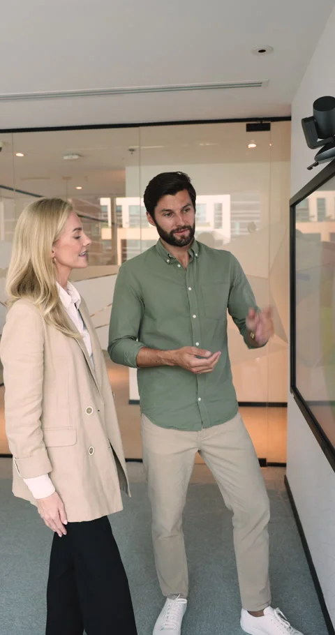 Friendly teammates discussing data, finish teamwork, giving high five Stock Footage 273136075