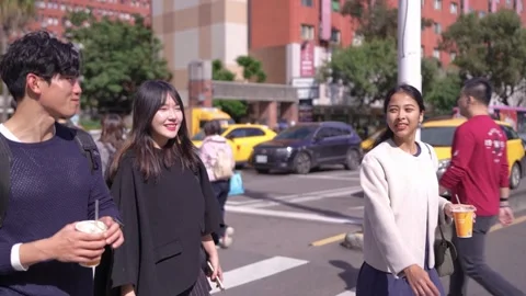 Friendly Walk and Chat on Street Near University in Da’an District, Taipei Stock-Footage 281079938