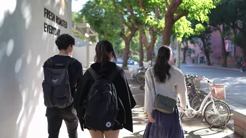 Friendly Walk and Chat on Street Near University in Da’an District, Taipei 動画素材 281080071