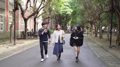 Friendly Walk and Chat on University Campus in Da’an District, Taipei Stock Footage 281079389