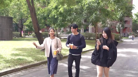 Friendly Walk and Chat on University Campus in Da’an District, Taipei Stock Footage 281079576