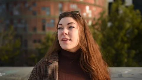 Friendly woman looking at camera Stock Footage 169601632