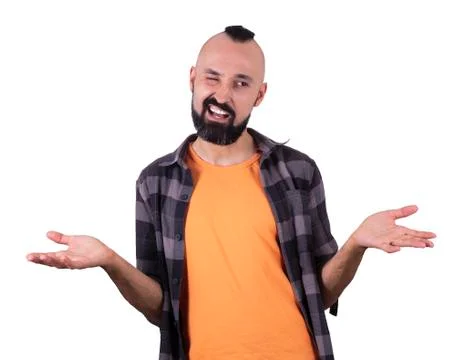 Friendly young man cheerfully winking and smiling Stock Photos