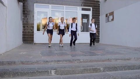 Friends Are Going to School. They Have A Lot of Fun Because Today is Their First 스톡 동영상 94331736