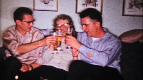 Friends are having fun drinking beer at home 1950s vintage film home movie 4812 Stock Footage 87721341