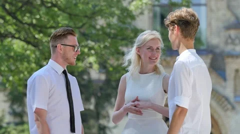 Friends Are Talking Young Men Shaking Hands Smiling Making an Agreement Stock Footage 64812554