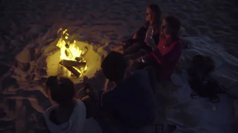 Friends around the fire Stock Footage 53495343