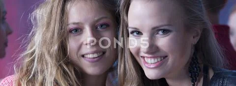 Friends attending the concert Stock Photos