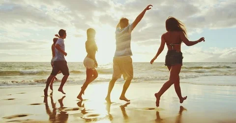 Friends on the Beach at Sunset Stock Footage 81229161