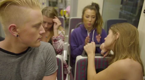 Friends being bored while on subway Stock Footage 54260855
