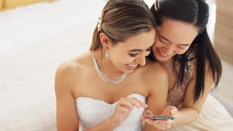 Friends, bride and bridesmaid smartphone selfie smile together for fun wedding Stock Photos