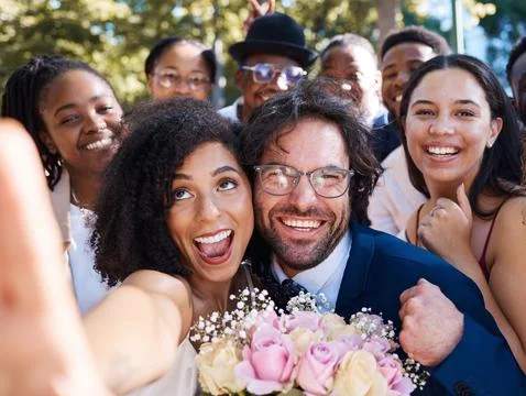 Friends, bride and groom with wedding selfie for outdoor ceremony celebration of Stock Photos