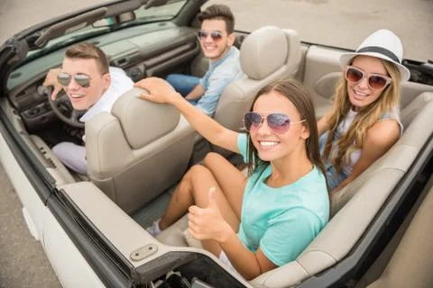 Friends in cabriolet Foto stock