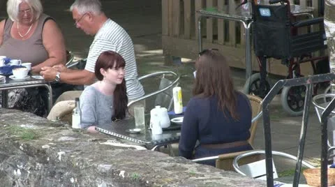Friends on Cafe Patio Stock Footage 18010527