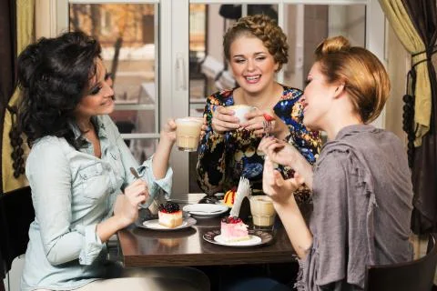Friends in cafe Stock Photos