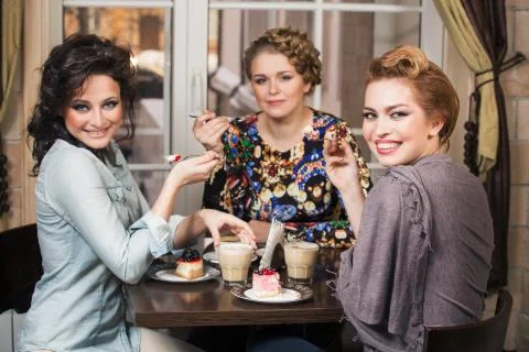 Friends in cafe Stock Photos