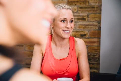 Friends In A Cafe Stock Photos