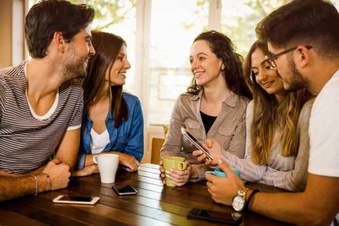Friends at the cafe Stock Photos