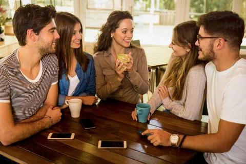 Friends at the cafe Stock Photos