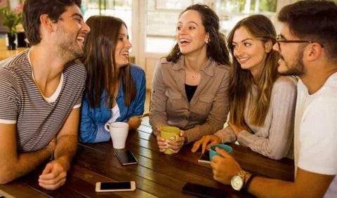 Friends at the cafe Stock Photos
